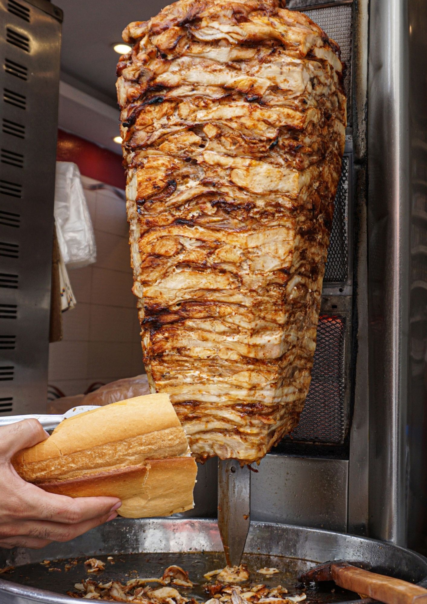 Two models wearing women's black cotton crewneck tee and off-white cotton crewneck tee.